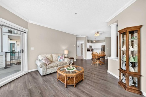210-78 Prestwick Gardens Se, Calgary, AB - Indoor Photo Showing Living Room