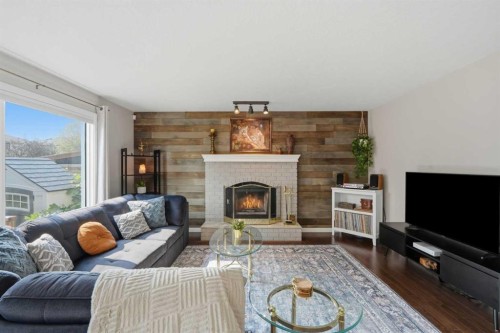 161 Douglasbank Way Se, Calgary, AB - Indoor Photo Showing Living Room With Fireplace