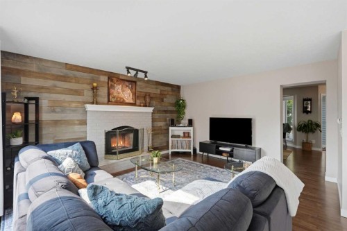 161 Douglasbank Way Se, Calgary, AB - Indoor Photo Showing Living Room With Fireplace