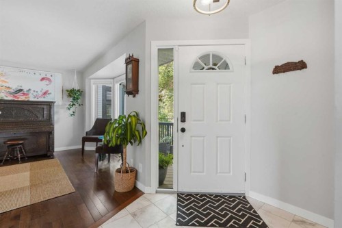 161 Douglasbank Way Se, Calgary, AB - Indoor Photo Showing Other Room With Fireplace