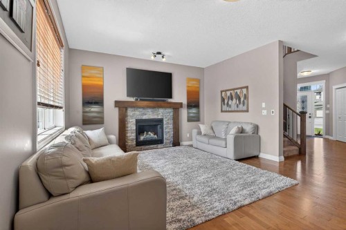 159 Sherwood Crescent Nw, Calgary, AB - Indoor Photo Showing Living Room With Fireplace