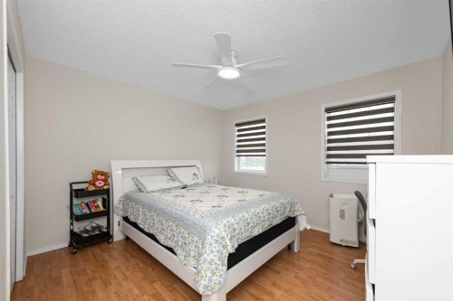 210 Taracove Landing Ne, Calgary, AB - Indoor Photo Showing Bedroom