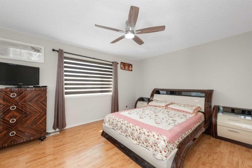 210 Taracove Landing Ne, Calgary, AB - Indoor Photo Showing Bedroom