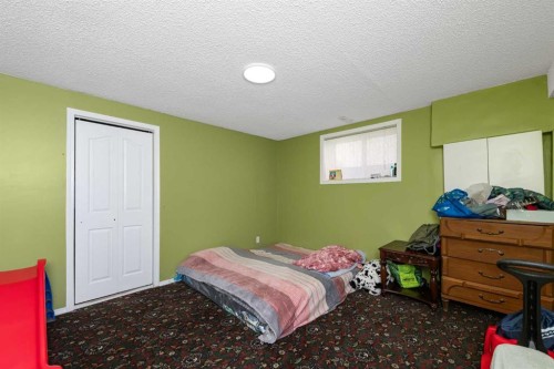210 Taracove Landing Ne, Calgary, AB - Indoor Photo Showing Bedroom