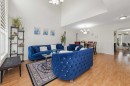 210 Taracove Landing Ne, Calgary, AB  - Indoor Photo Showing Living Room 