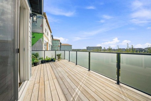 303 Cornerbrook Drive Ne, Calgary, AB - Outdoor With Body Of Water With Deck Patio Veranda