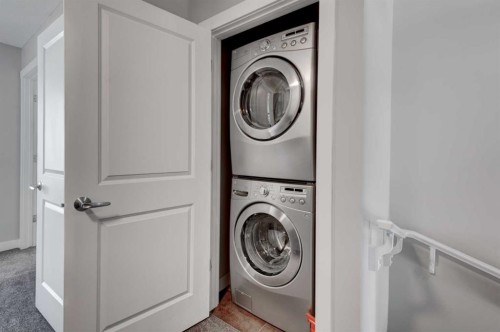24 Aspen Hills Common Sw, Calgary, AB - Indoor Photo Showing Laundry Room