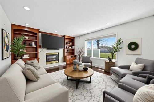98 Hampstead Circle Nw, Calgary, AB - Indoor Photo Showing Living Room With Fireplace