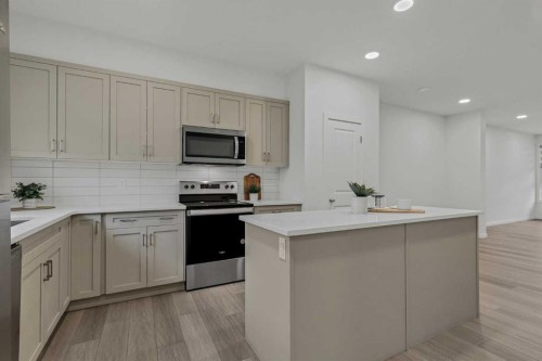 172 Belmont Way Sw, Calgary, AB - Indoor Photo Showing Kitchen With Upgraded Kitchen