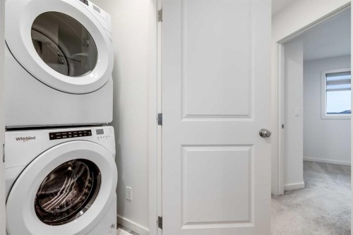 172 Belmont Way Sw, Calgary, AB - Indoor Photo Showing Laundry Room