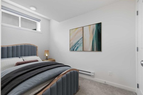 172 Belmont Way Sw, Calgary, AB - Indoor Photo Showing Bedroom