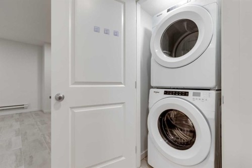 172 Belmont Way Sw, Calgary, AB - Indoor Photo Showing Laundry Room