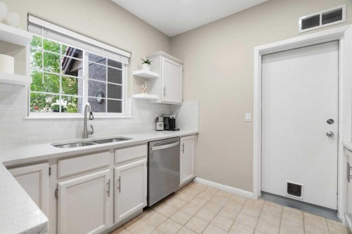 101-1997 Sirocco Drive Sw, Calgary, AB - Indoor Photo Showing Kitchen With Double Sink