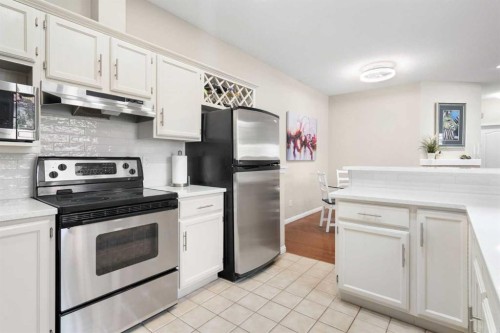 101-1997 Sirocco Drive Sw, Calgary, AB - Indoor Photo Showing Kitchen With Stainless Steel Kitchen
