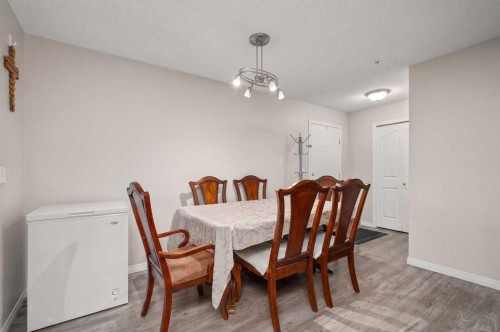 2105-2371 Eversyde Avenue Sw, Calgary, AB - Indoor Photo Showing Dining Room