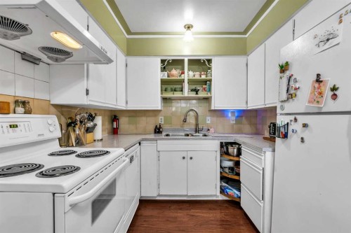 5820 Dalmead Crescent Nw, Calgary, AB - Indoor Photo Showing Kitchen With Double Sink