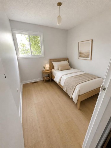 1219 68 Street Ne, Calgary, AB - Indoor Photo Showing Bedroom