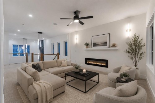 135 South Shore Road, Chestermere, AB - Indoor Photo Showing Living Room With Fireplace