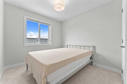 919 Walgrove Boulevard Se, Calgary, AB - Indoor Photo Showing Bedroom