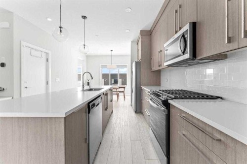 919 Walgrove Boulevard Se, Calgary, AB - Indoor Photo Showing Kitchen With Upgraded Kitchen