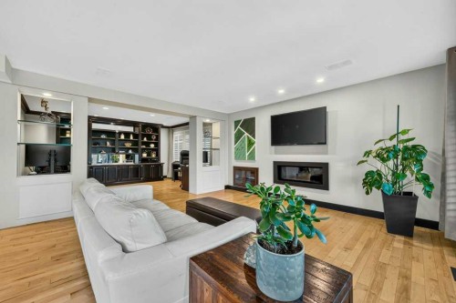 95 Woodridge Close Sw, Calgary, AB - Indoor Photo Showing Living Room With Fireplace