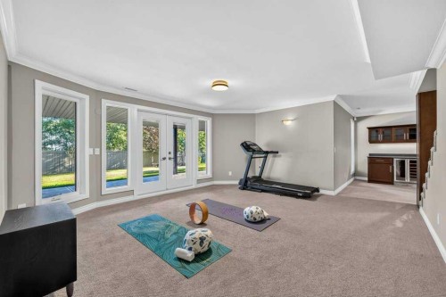 95 Woodridge Close Sw, Calgary, AB - Indoor Photo Showing Gym Room