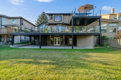 95 Woodridge Close Sw, Calgary, AB - Outdoor With Balcony With Deck Patio Veranda