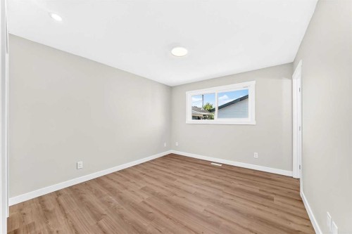 704 Malvern Drive Ne, Calgary, AB - Indoor Photo Showing Other Room