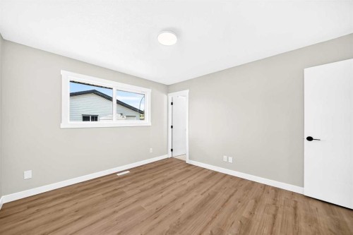 704 Malvern Drive Ne, Calgary, AB - Indoor Photo Showing Other Room