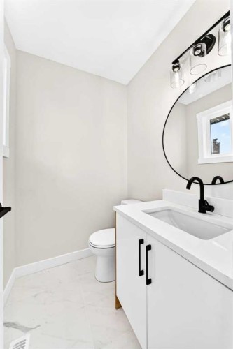 704 Malvern Drive Ne, Calgary, AB - Indoor Photo Showing Bathroom