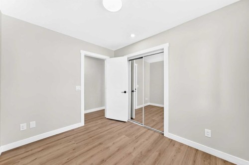 704 Malvern Drive Ne, Calgary, AB - Indoor Photo Showing Other Room