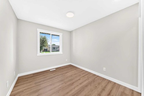 704 Malvern Drive Ne, Calgary, AB - Indoor Photo Showing Other Room