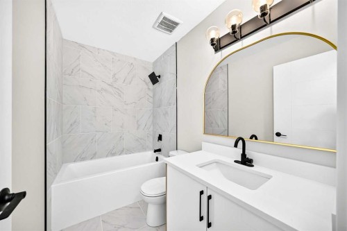 704 Malvern Drive Ne, Calgary, AB - Indoor Photo Showing Bathroom