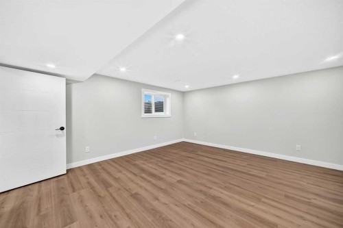 704 Malvern Drive Ne, Calgary, AB - Indoor Photo Showing Other Room