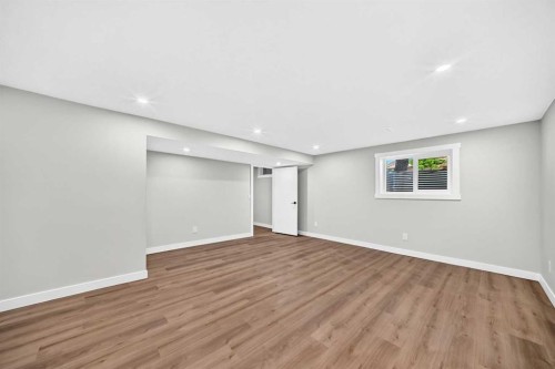 704 Malvern Drive Ne, Calgary, AB - Indoor Photo Showing Other Room