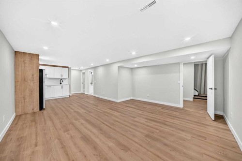 704 Malvern Drive Ne, Calgary, AB - Indoor Photo Showing Other Room