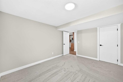 704 Malvern Drive Ne, Calgary, AB - Indoor Photo Showing Other Room