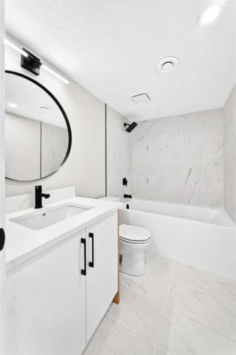 704 Malvern Drive Ne, Calgary, AB - Indoor Photo Showing Bathroom