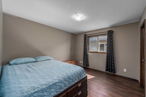 173 Pantego Road Nw, Calgary, AB - Indoor Photo Showing Bedroom