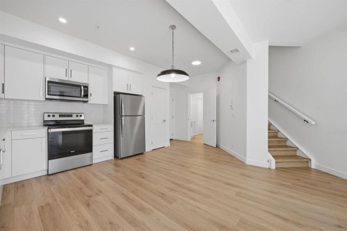 2218-151 Skyview Bay Ne, Calgary, AB - Indoor Photo Showing Kitchen With Stainless Steel Kitchen With Upgraded Kitchen