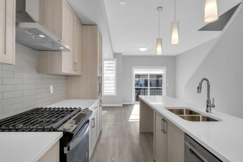 924 Sage Hill Grove Nw, Calgary, AB - Indoor Photo Showing Kitchen With Stainless Steel Kitchen With Double Sink With Upgraded Kitchen