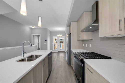 924 Sage Hill Grove Nw, Calgary, AB - Indoor Photo Showing Kitchen With Double Sink With Upgraded Kitchen