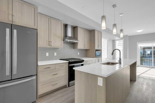 924 Sage Hill Grove Nw, Calgary, AB - Indoor Photo Showing Kitchen With Stainless Steel Kitchen With Double Sink With Upgraded Kitchen