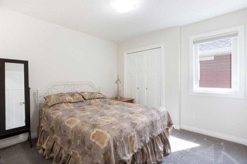 87 Baywater Rise Sw, Airdrie, AB - Indoor Photo Showing Bedroom