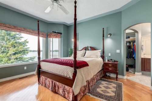 1001 East Chestermere Drive, Chestermere, AB - Indoor Photo Showing Bedroom