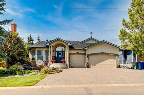 1001 East Chestermere Drive, Chestermere, AB - Outdoor With Facade