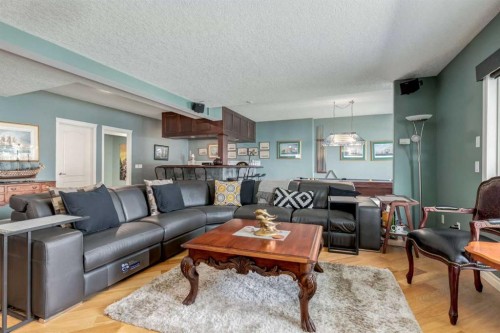 1001 East Chestermere Drive, Chestermere, AB - Indoor Photo Showing Living Room