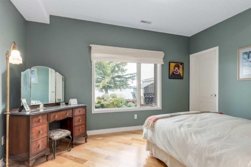 1001 East Chestermere Drive, Chestermere, AB - Indoor Photo Showing Bedroom