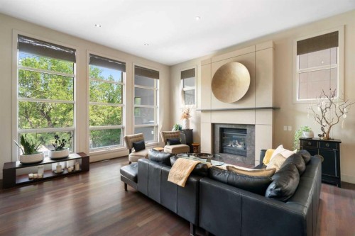 1215 Sifton Boulevard Sw, Calgary, AB - Indoor Photo Showing Living Room With Fireplace