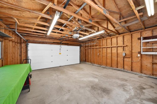 136 Midlawn Close Se, Calgary, AB - Indoor Photo Showing Garage